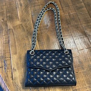 Black Rebecca Minkoff quilted mini affair crossbody.